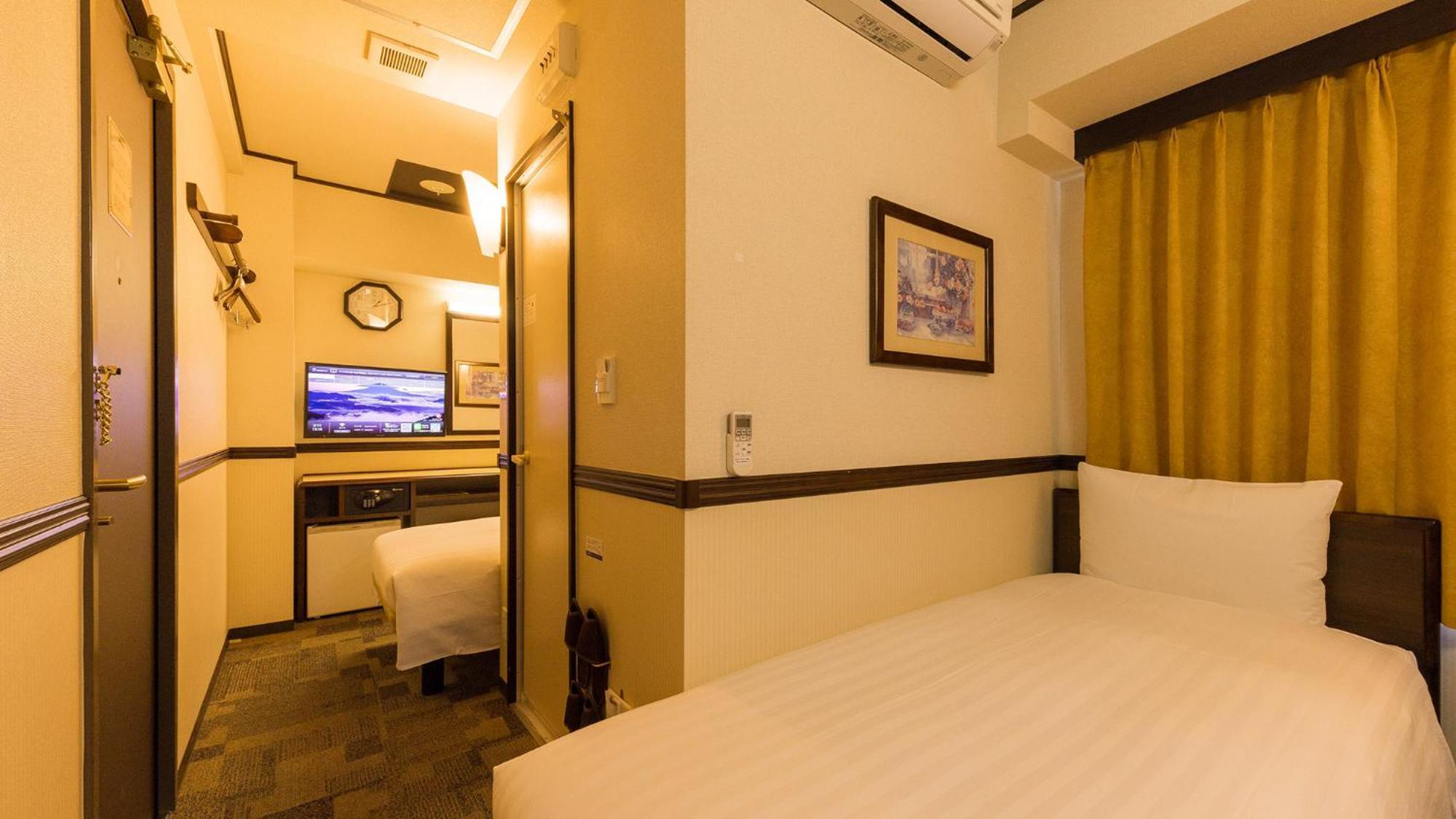 Toyoko Inn Osaka Shinsaibashi Nishi Rom bilde