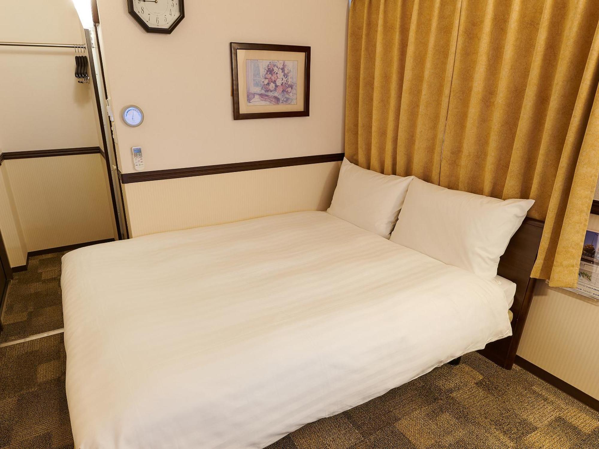 Toyoko Inn Osaka Shinsaibashi Nishi Rom bilde